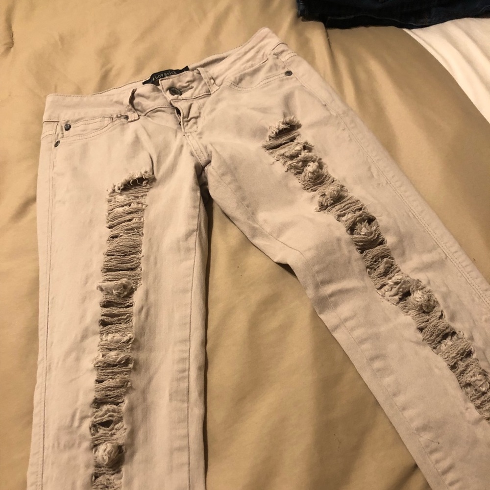 Tan ripped jeans